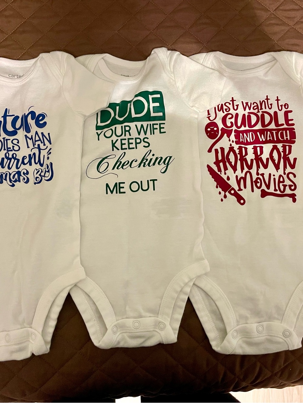 Carter's White Baby One-Piece Trio with Blue, Green, and Red Prints